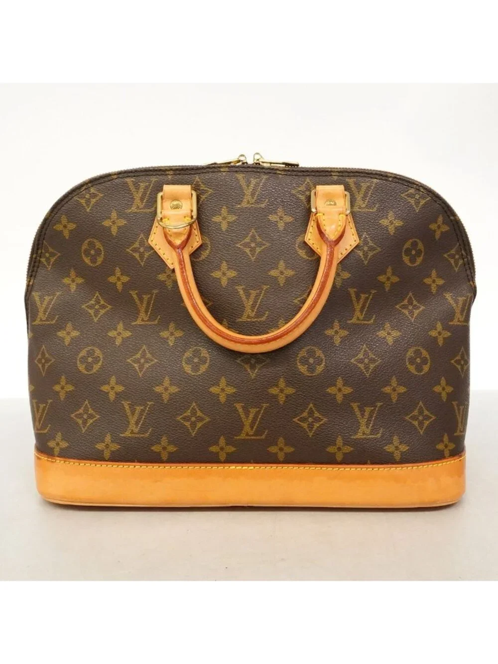 Louis Vuitton Monogram Alma Brown Handbag